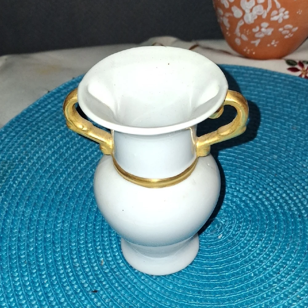 Elegant White Vase with Gold Accents